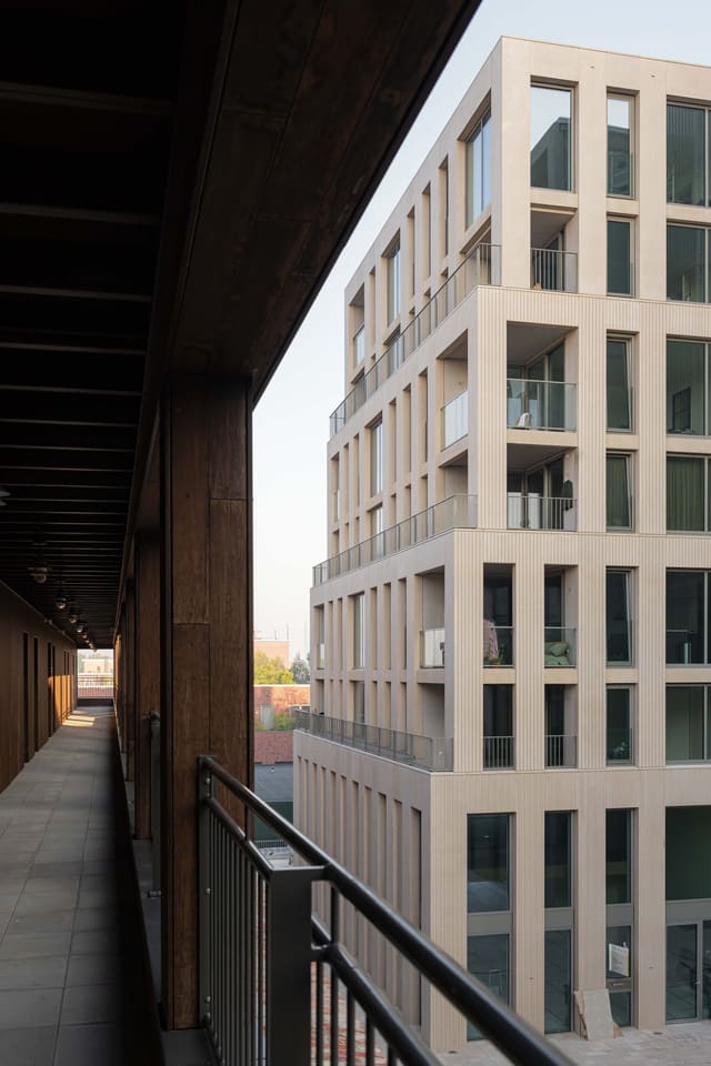 The white residential block in specially profiled concrete